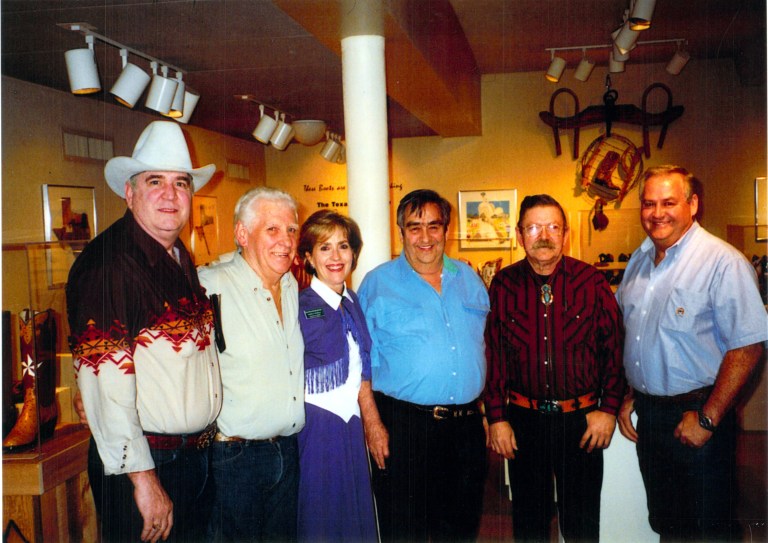 From left, Abilene bootmakers Alan Bell and James Leddy; Judy Tedford, curator of the Grace Museum; and bootmakers Dave Little of San Antonio, Tex Robin of Coleman, Texas, and Eddie Kimmel, of Comanche, Texas, at the Bootmakers Gala at the Grace Museum in  Abilene in 2000.