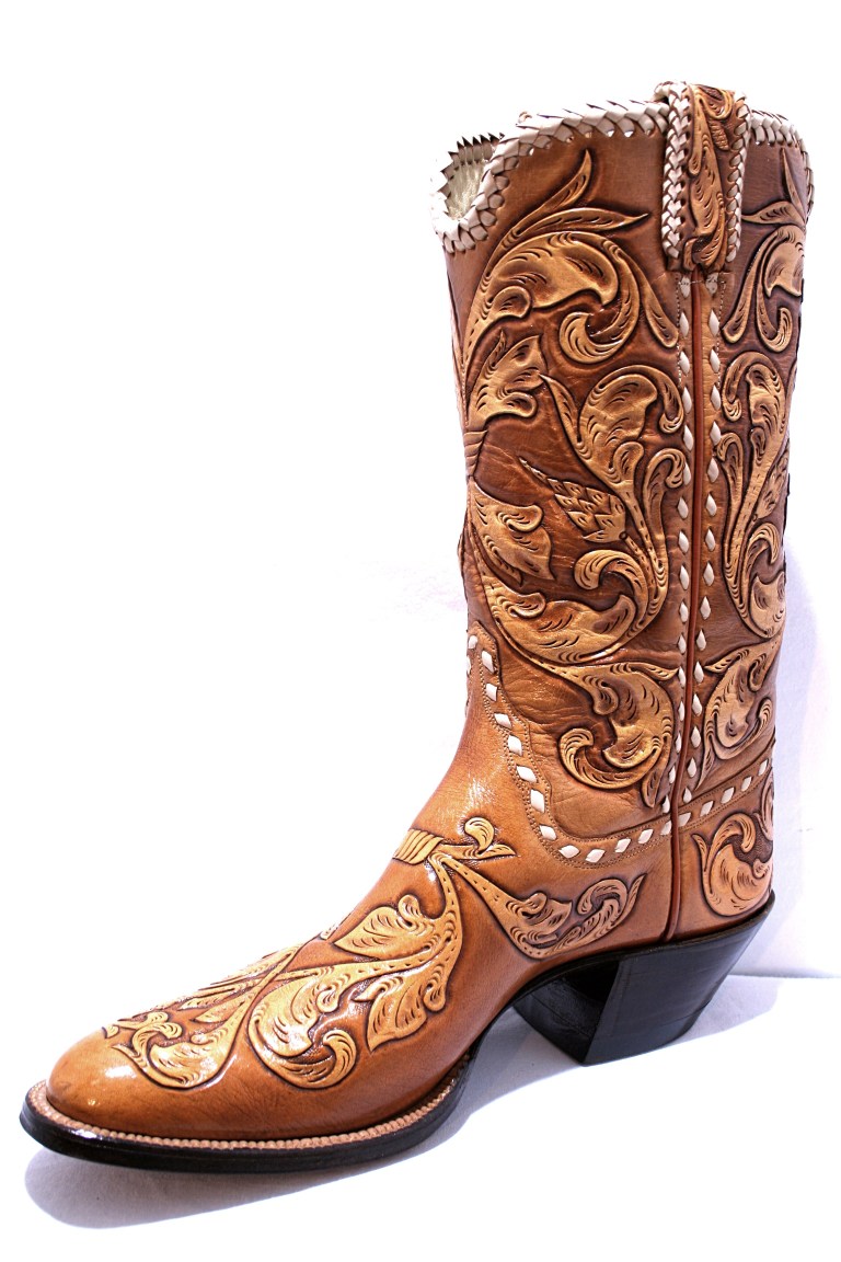 Alan Bell made this boot in 1976 while working for Tex Robin. This pair was chosen to represent all custom Texas bootmakers in the Handmade and Heartfelt: Contemporary Folk Art in Texas exhibit that traveled to Texas museums as part of the state’s sesquicentennial celebration in 1986-1987. Bell calls this the “most important boot I’ve made.”