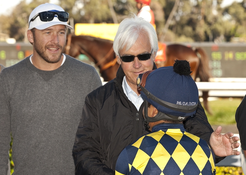 Winning owner: Bode Miller with Bob Baffert and jockey Martin Garcia after Carving, which he owned in partnership with Baffert’s wife, won at Hollywood Park in 2012. Benoit photo