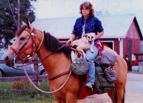 Melissa, her horse Rainy, and her dog Gypsy