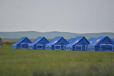 Riders camp in tents and live off the grid for 10 days while traveling across Mongolia. © Gobi Desert Cup