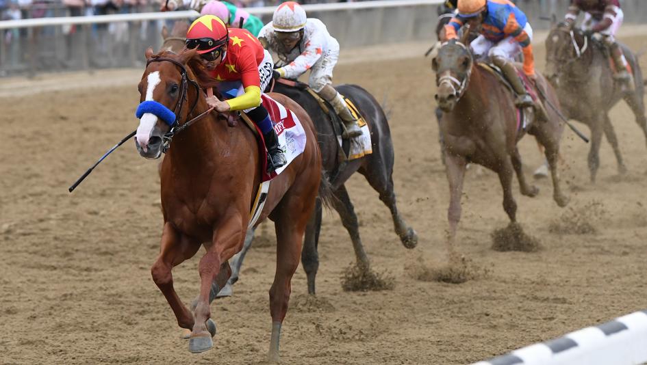 Justify captures the Belmont Stakes to become the 13th Triple Crown winner in history. (NYRA/Chelsea Durand)