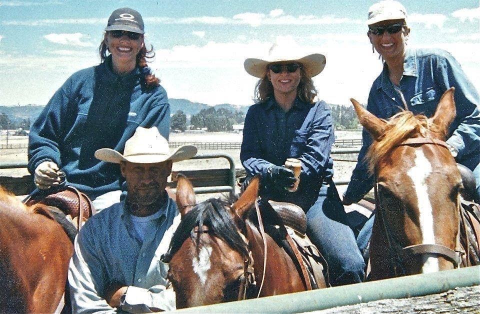 Lori (middle) working cattle on a Quarter Horse that is now retired on her farm. Photo courtesy of Lori Johnston