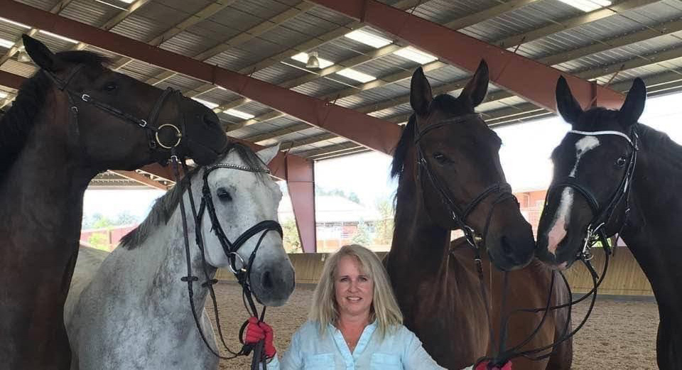 Lori and Corduroy (retired), Casper (with a junior rider now), George (retired), and Johnny Cash (sold). Photo courtesy of Lori Johnston