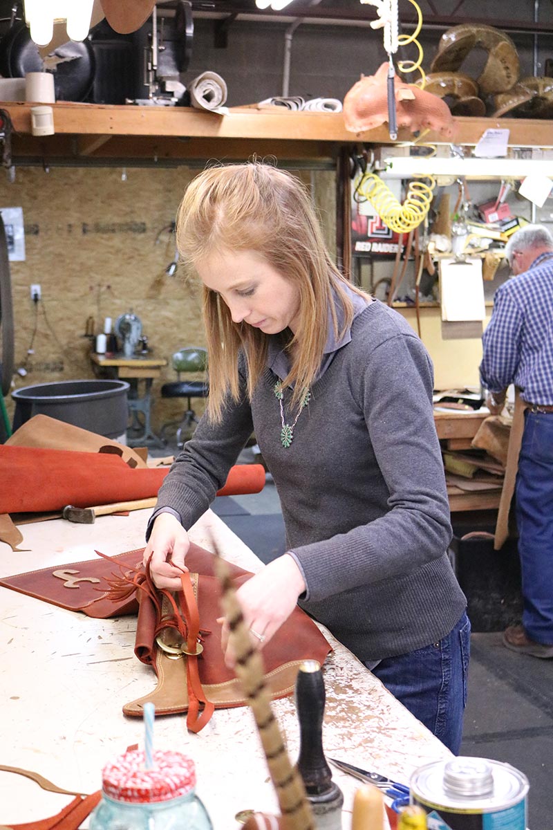 Hannah Mills finishing up a pair of chaps
