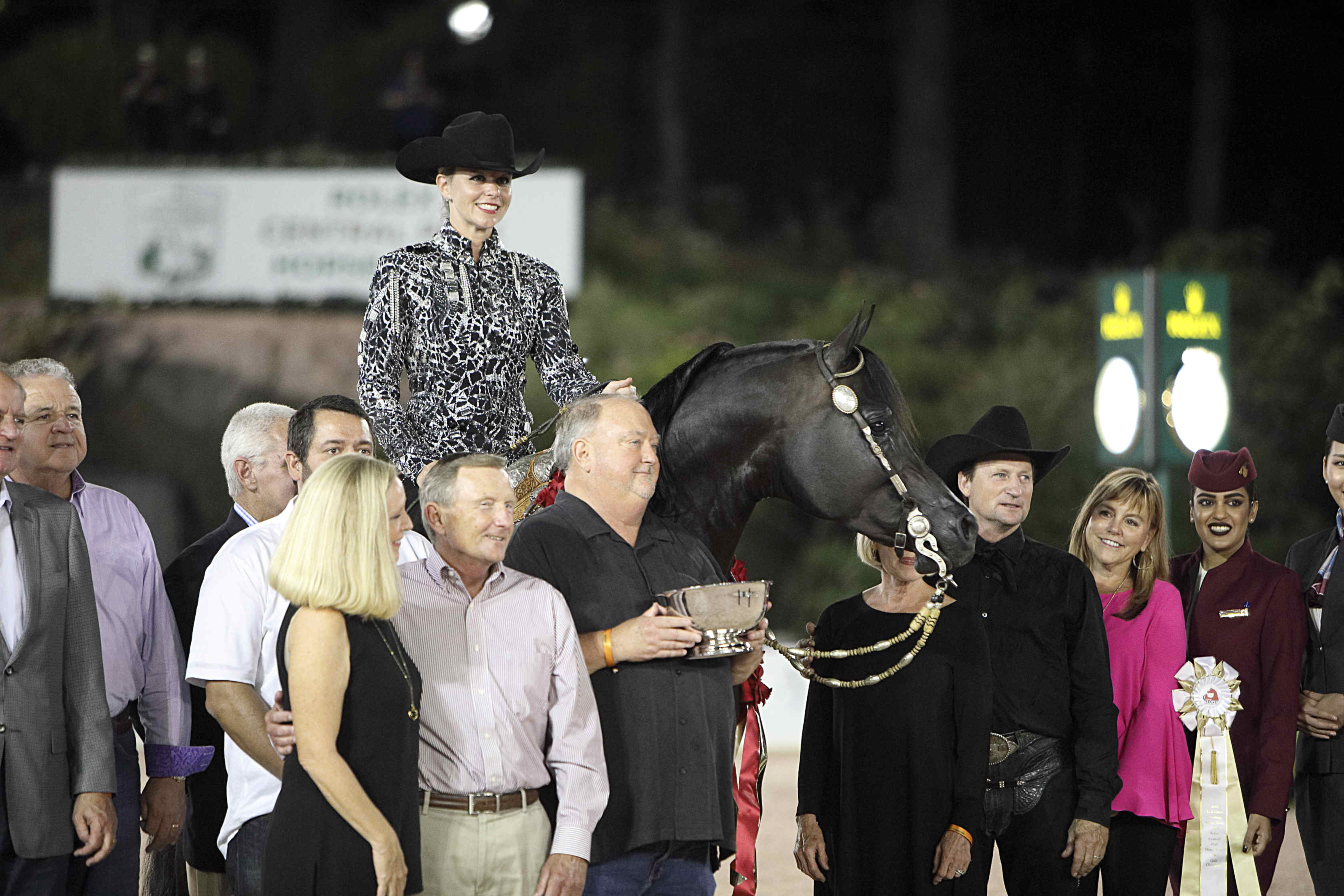 PA Kid Khan - Gold Champion Arabian Western Pleasure with trainer pro rider Rob Bick (standing) & amateur rider Janie Heslep, photo courtesy of RCPHS 