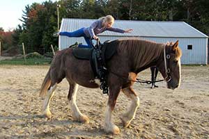 Ten-year-old gymnast Eva Beal of Ellsworth executes the “flag” and other basic moves at Starlight Horse Farm. Ellsworth American Photo by Maxwell Hauptman