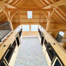 The Art and Heart in Timber Frame Horse Barns and Pavilions